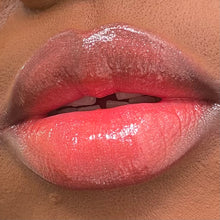 Load image into Gallery viewer, Pink Coral Shimmer lip gloss lip swatch
